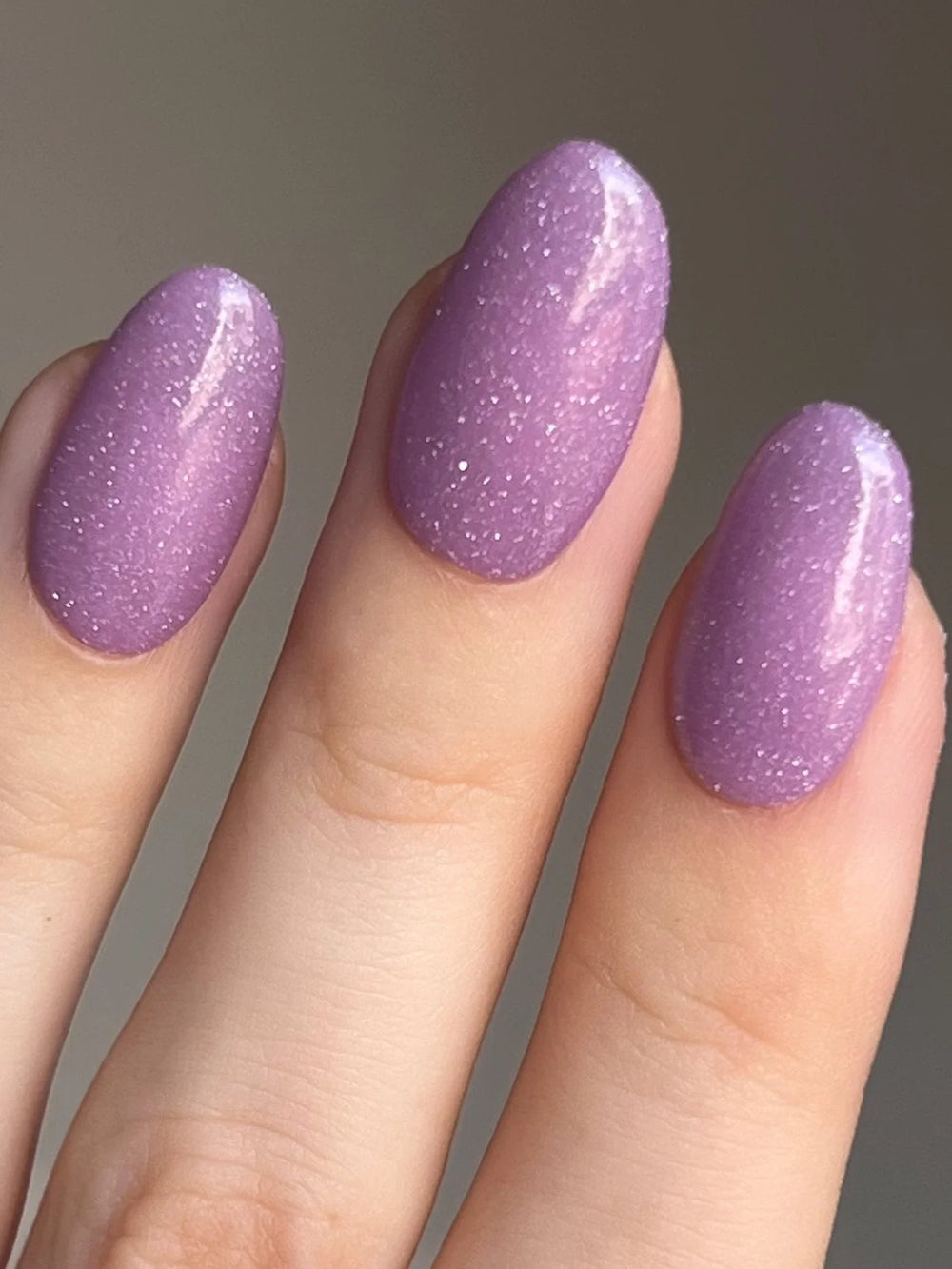 Violet Sand en la mano