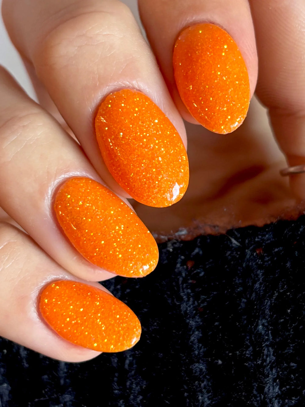 Tangerine Orange en la mano